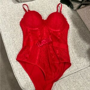 Spirit Halloween red body suit 
Brand New